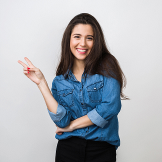portrait-young-pretty-woman-smiling-blue-denim-shirt-happy-positive-mood-isolated-sincere-smile-long-hair-showing-peace-sign-positive-mood 1